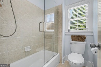Golf-front Bentwater brick home with a private pool, a three-car - photo 23