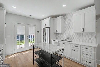 Golf-front Bentwater brick home with a private pool, a three-car - photo 45