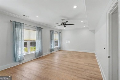 Golf-front Bentwater brick home with a private pool, a three-car - photo 47