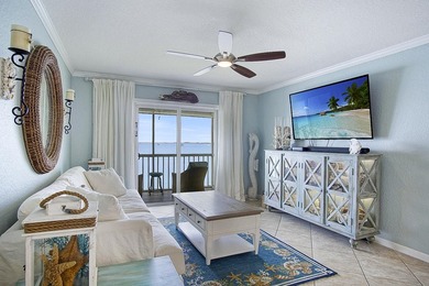 Tucked away just moments from the shoreline, this immaculate - photo 6