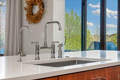 Sleek, custom contemporary set directly on the fairways of - photo 16