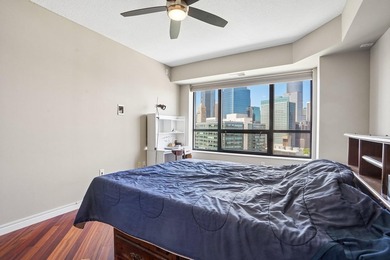 Elevated above the city on the 19th floor, this stunning corner - photo 16