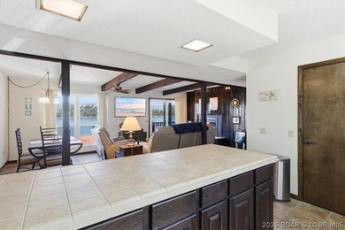 Looking for the perfect lake retreat? This Osage Heritage condo - photo 13