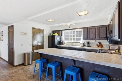 Looking for the perfect lake retreat? This Osage Heritage condo - photo 14