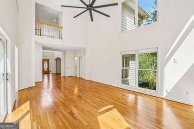 Nestled on a quiet cul-de-sac lot backing to acres of private - photo 3
