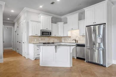 Experience exceptional waterfront living in this custom-built - photo 38