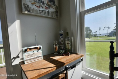 Discover elevated coastal living in Whittaker Point, one of - photo 11