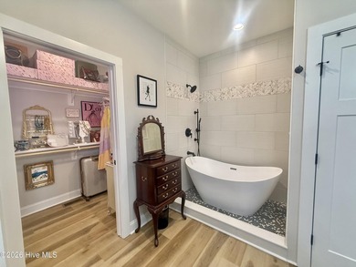 Discover elevated coastal living in Whittaker Point, one of - photo 19