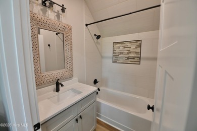 Discover elevated coastal living in Whittaker Point, one of - photo 23