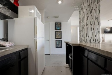 Experience stylish urban living in this beautifully updated 1