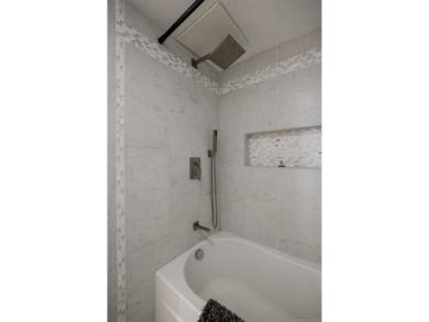 Experience stylish urban living in this beautifully updated 1