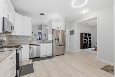 Beautifully updated and backing to a peaceful preserve, this - photo 12