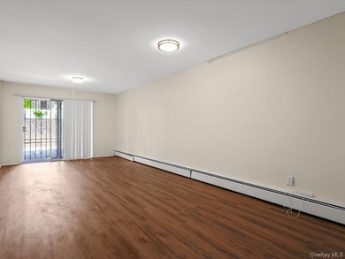 This three-story brick two-family home in Cypress Hills features - photo 16