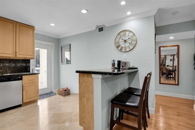 Welcome to this beautifully updated and fully furnished 2BR/2BA