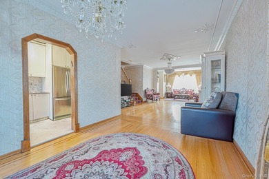 Discover this beautifully renovated legal two-family home in the - photo 5