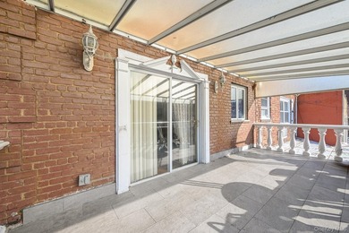 Discover this beautifully renovated legal two-family home in the - photo 10
