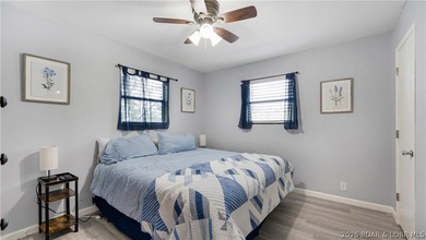 Lakefront living in a wide, quiet cove on the Gravois Arm! - photo 12