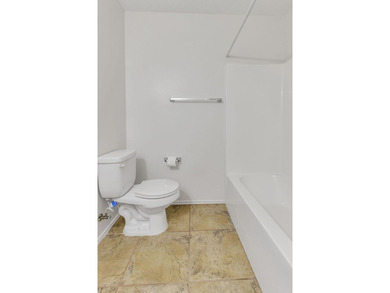 As you step inside you'll find tile floors flowing through the - photo 13