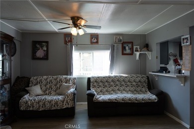 Ready to move in! This affordable, low land lease mobile home in - photo 6