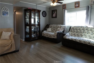 Ready to move in! This affordable, low land lease mobile home in - photo 7