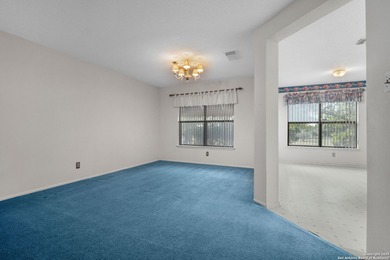 Set on a green belt within the Fairways of Woodlake gated