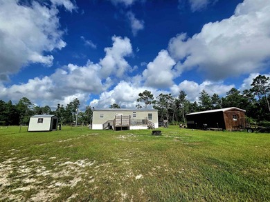 Wow...Look at this home only miles from the Gulf! This sweet - photo 4