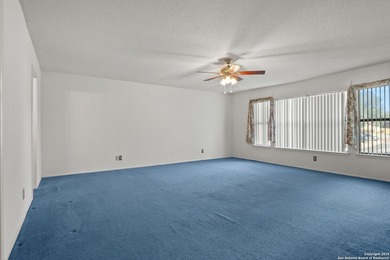 Set on a green belt within the Fairways of Woodlake gated