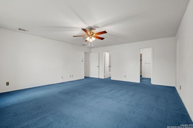 Set on a green belt within the Fairways of Woodlake gated