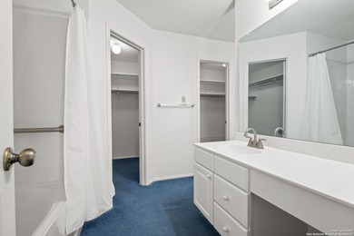 Set on a green belt within the Fairways of Woodlake gated