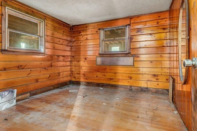 Quaint log cabin with attached incomplete 30 x 40 multi story - photo 6