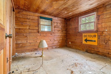 Quaint log cabin with attached incomplete 30 x 40 multi story - photo 7