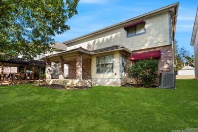 Set on a green belt within the Fairways of Woodlake gated