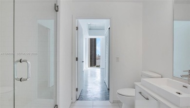 Beautiful 2 bedroom/2 bathroom loft style corner unit located in