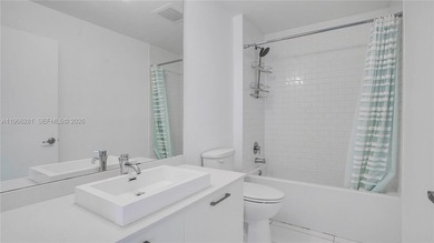 Beautiful 2 bedroom/2 bathroom loft style corner unit located in