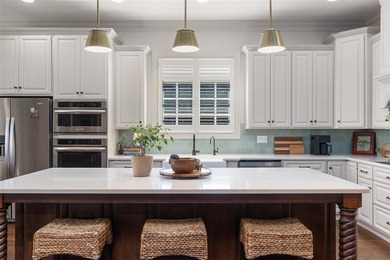 Located in the prestigious Olde Stone community, this stunning - photo 6