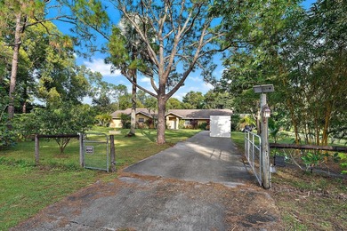 Back on the Market! NEW ROOF!Jupiter Farms Acre+ Retreat with - photo 27