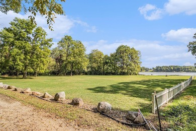 This lakefront lot is a rare find on Pleasant Lake in Three - photo 2