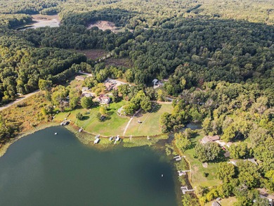 This lakefront lot is a rare find on Pleasant Lake in Three - photo 3