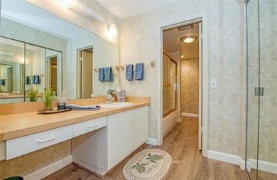 This single-level villa-style condo is nestled in a highly - photo 9