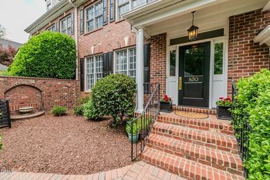 Nestled on a tranquil private street in the historic heart of - photo 3
