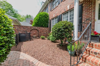 Nestled on a tranquil private street in the historic heart of - photo 4