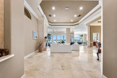 Nestled in the heart of Tequesta Country Club, this rare - photo 13