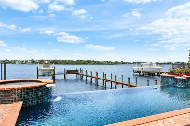 Nestled in the heart of Tequesta Country Club, this rare - photo 25