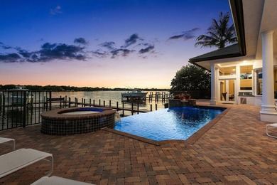 Nestled in the heart of Tequesta Country Club, this rare - photo 29