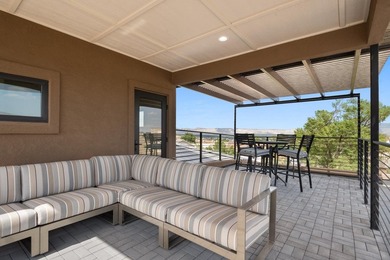 Located in the prestigious Redlands Mesa Golf Community, this - photo 4