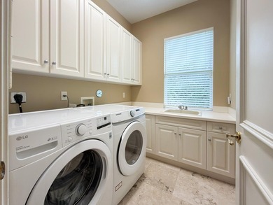 Nestled in the heart of Tequesta Country Club, this rare - photo 49