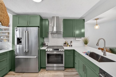 RARELY AVAILABLE and beautifully updated, 3- bed, 2- bath - photo 11
