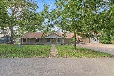 Adorable log cabin lake house situated on two and a half lots on - Lake Home For Sale in Payne Springs, Texas