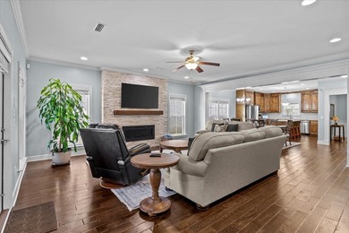 Tucked inside the Village of Highlands South, this 4-bedroom