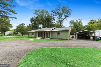 Beautifully remodeled and move-in ready, this 3-bedroom, 2-bath - photo 14